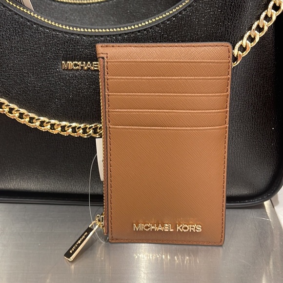 MICHAEL KORS
Jet Set Travel Medium Top Zip Leather Card Case Wallet 
Luggage
NWT - Picture 10 of 16